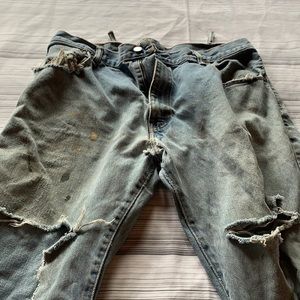 Men’s vintage Levi’s worn with holes